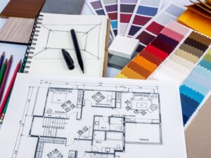 This is an image of house plans, color swatches and drawings.