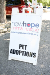 A sign for New Hope Animal Rescue Pet Adoptions