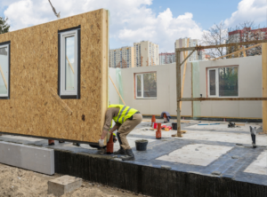 This is an image of a modular home being built.