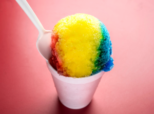 This is an image of a rainbow colored sno cone.