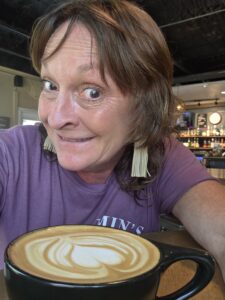 Kimberly Murphree enjoying coffee at Nomadic Outpost in South Austin
