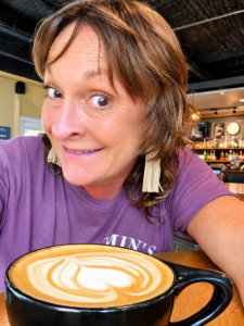 Kimberly Murphree enjoying coffee at Nomadic Outpost in South Austin