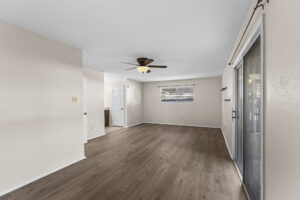 Main-floor primary bedroom with patio access at 2100 Kippling Dr. #128