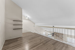 Upstairs loft overlooking the living room in this Austin condo.