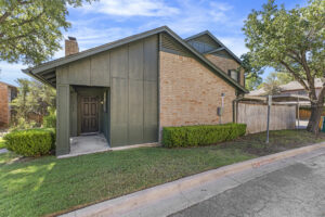 Exterior side of home looking at the front covered patio - 2100 Kippling Drive #128 condo for rent in Austin, TX 78752
