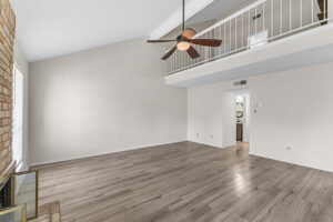 Living room with vaulted ceiling at 2100 Kippling Drive #128 , Austin TX 78752